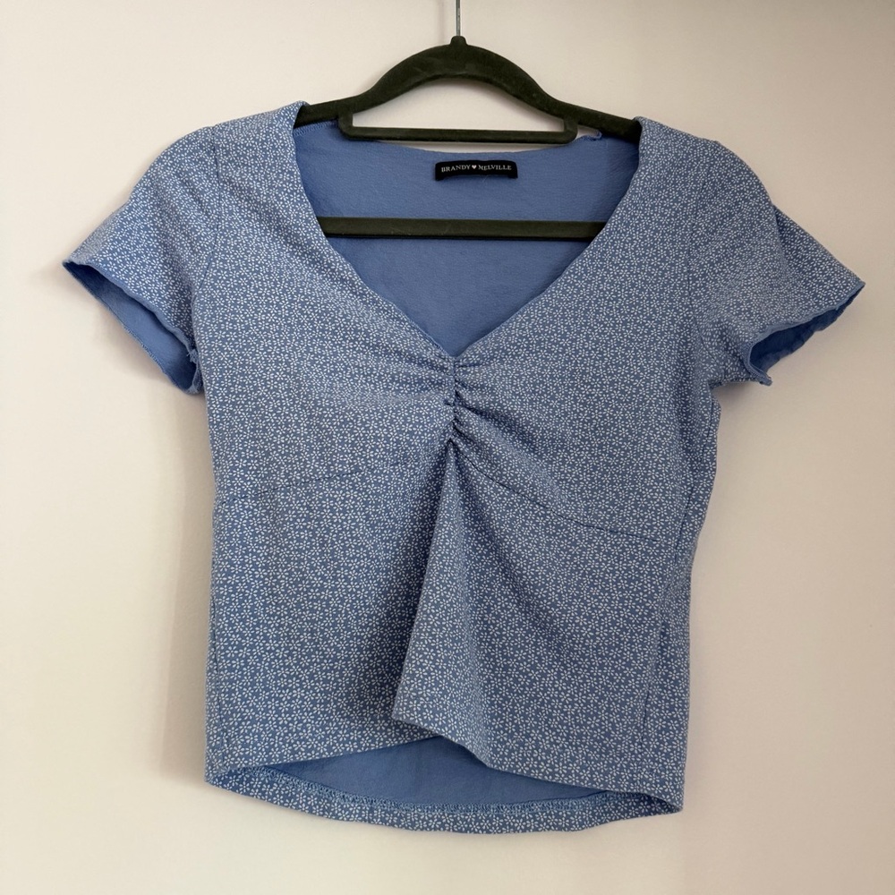 Brandy Melville Light Blue Top with White Floral Design